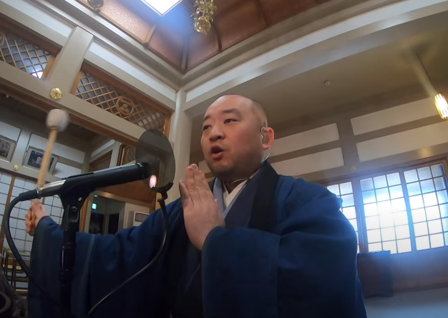 Buddhist monk singing yellow submarine